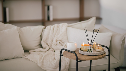 Mixing Textures: Pairing Candles with Throws, Pillows and Rugs